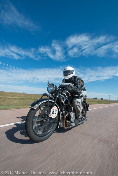 Darryl Richman on motorcycle cruising down the highway