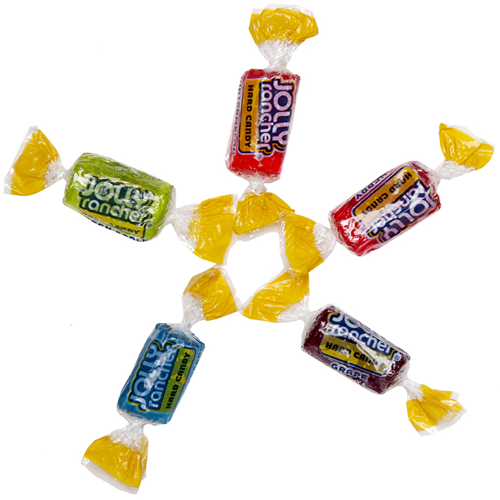 Individual jolly rancher flavors laid out to form a star