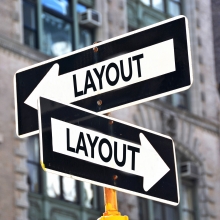 Street signs pointing in multiple directions labeled layout