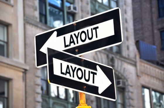 Street signs pointing in multiple directions labeled layout